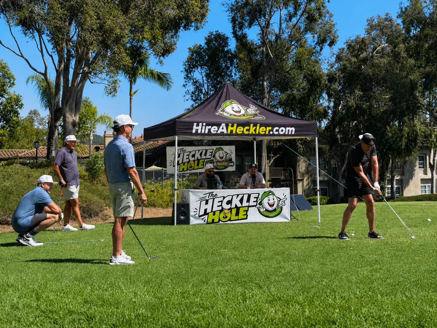Hire A Heckler comedians bringing a Back Off Challenge-style tee box comedy experience to a golf tournament